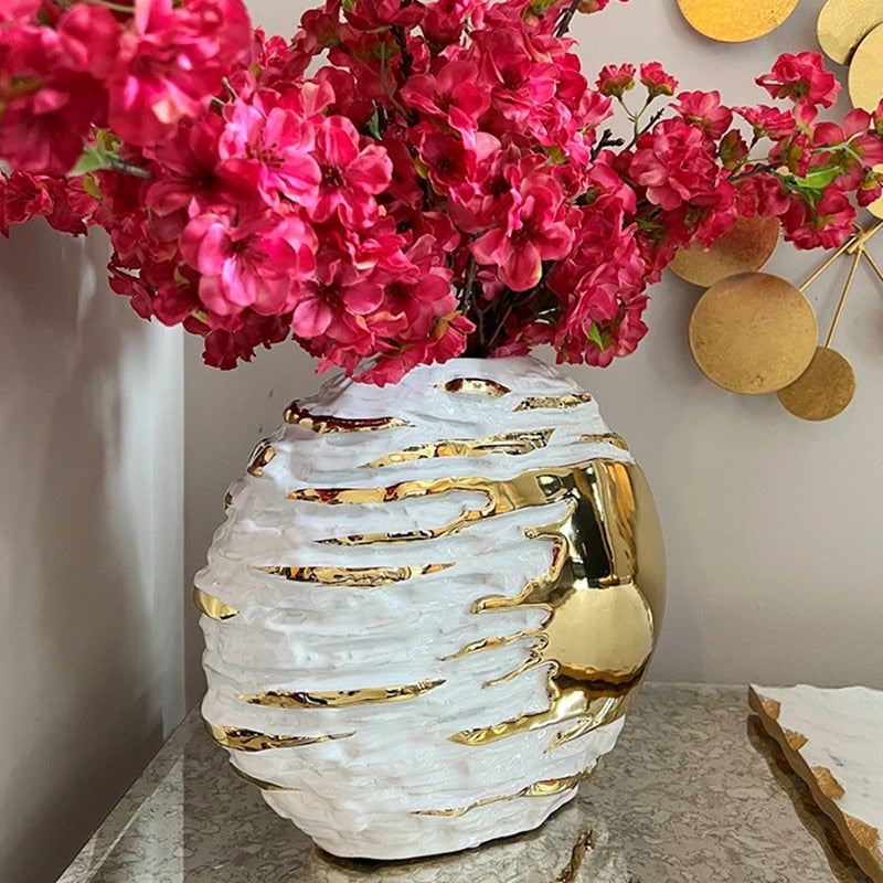 Gold & white vase, that's unique for creating amazing home decor