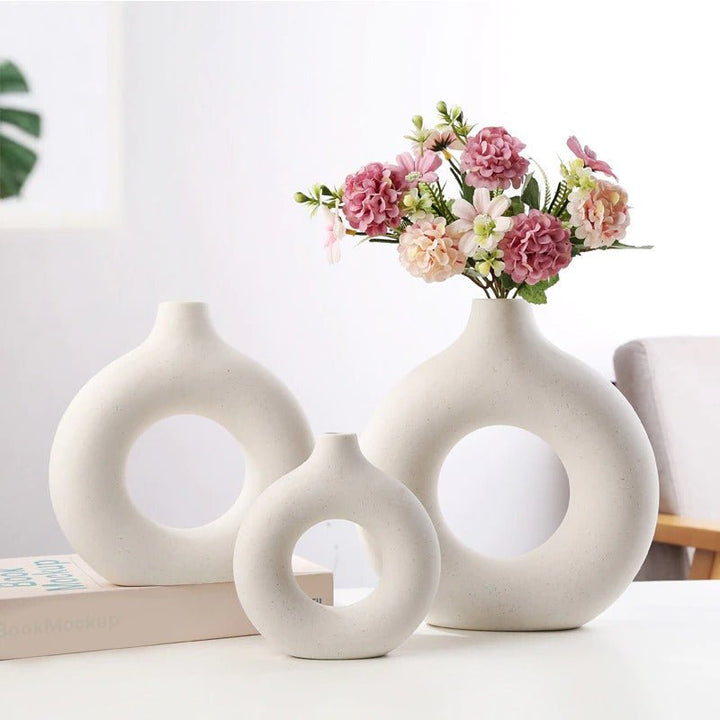 Berniece Ceramic Vase in soft blue with a classic silhouette and delicate pattern, ideal for enhancing home decor.