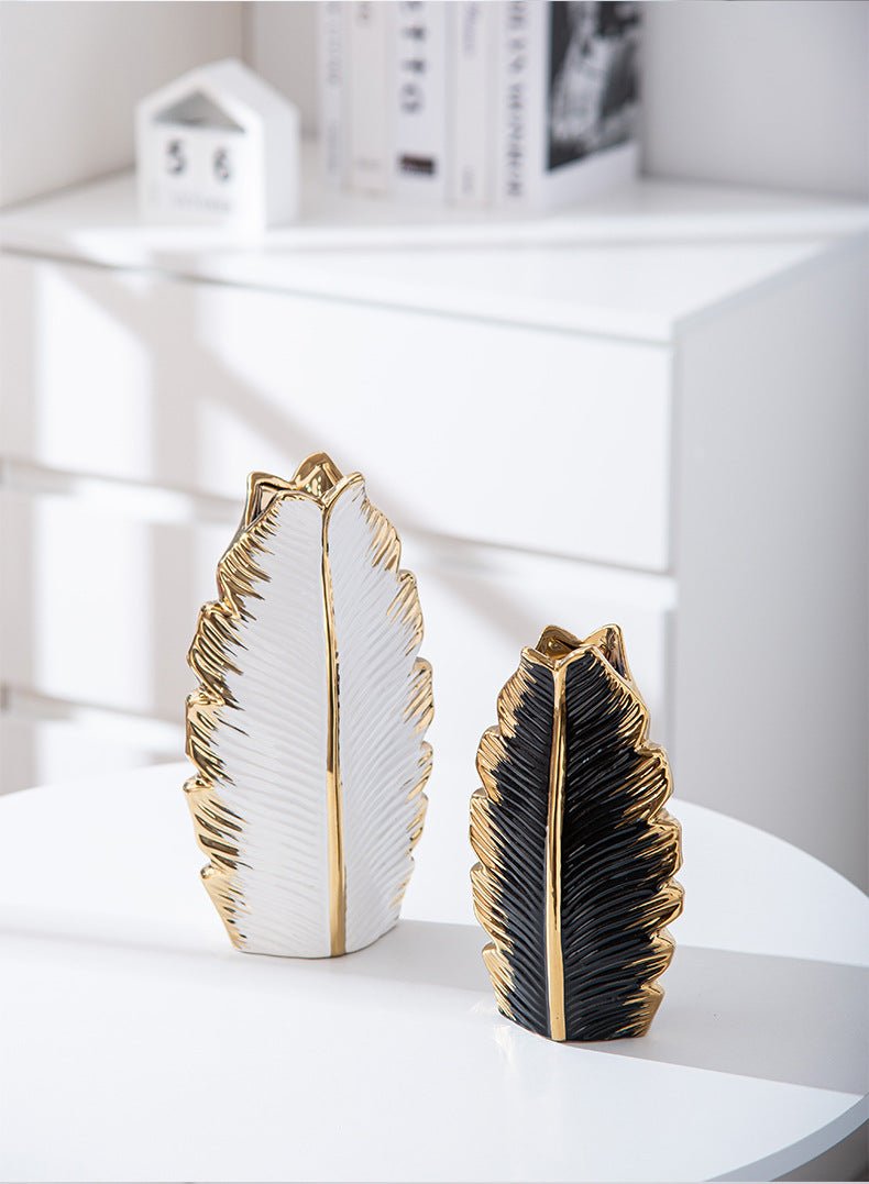 Elegant ceramic vases inspired by nature, featuring intricate leaf designs. Perfect for adding a touch of sophistication.