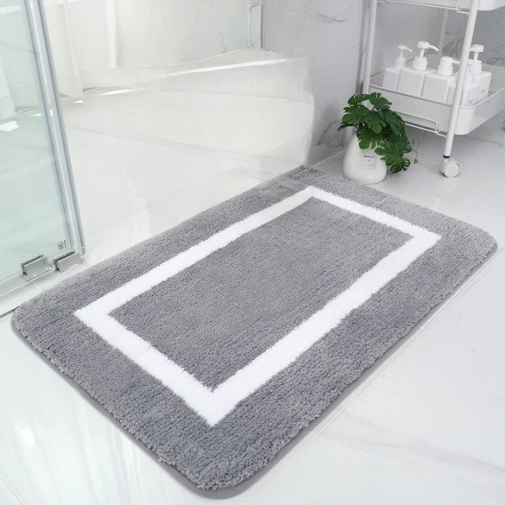 Medb Bath Mat, soft and absorbent, perfect for adding comfort and style to your bathroom while keeping your floors dry.