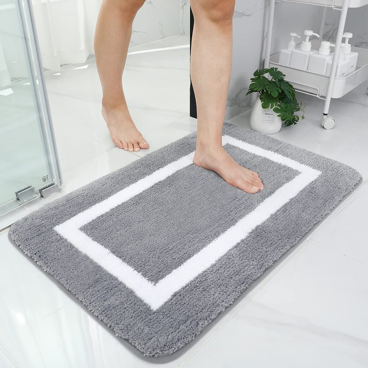 Medb Bath Mat, soft and absorbent, perfect for adding comfort and style to your bathroom while keeping your floors dry.