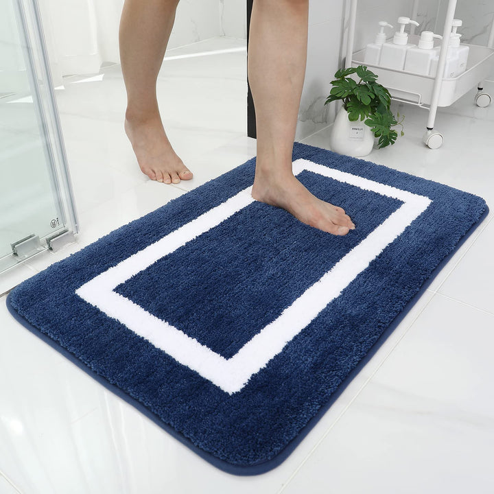 Medb Bath Mat, soft and absorbent, perfect for adding comfort and style to your bathroom while keeping your floors dry.