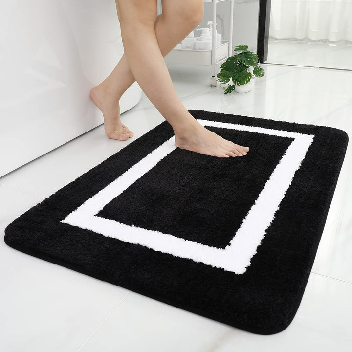 Medb Bath Mat, soft and absorbent, perfect for adding comfort and style to your bathroom while keeping your floors dry.