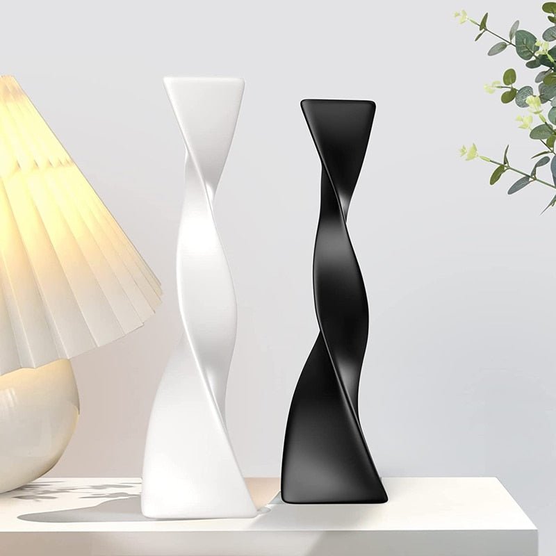 Unique Sprita Triangular Vase, featuring a sleek geometric design. Perfect for showcasing flowers or as a modern decor accent