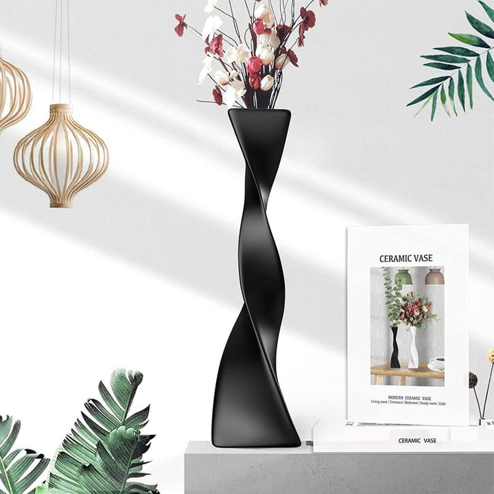 Unique Sprita Triangular Vase, featuring a sleek geometric design. Perfect for showcasing flowers or as a modern decor accent